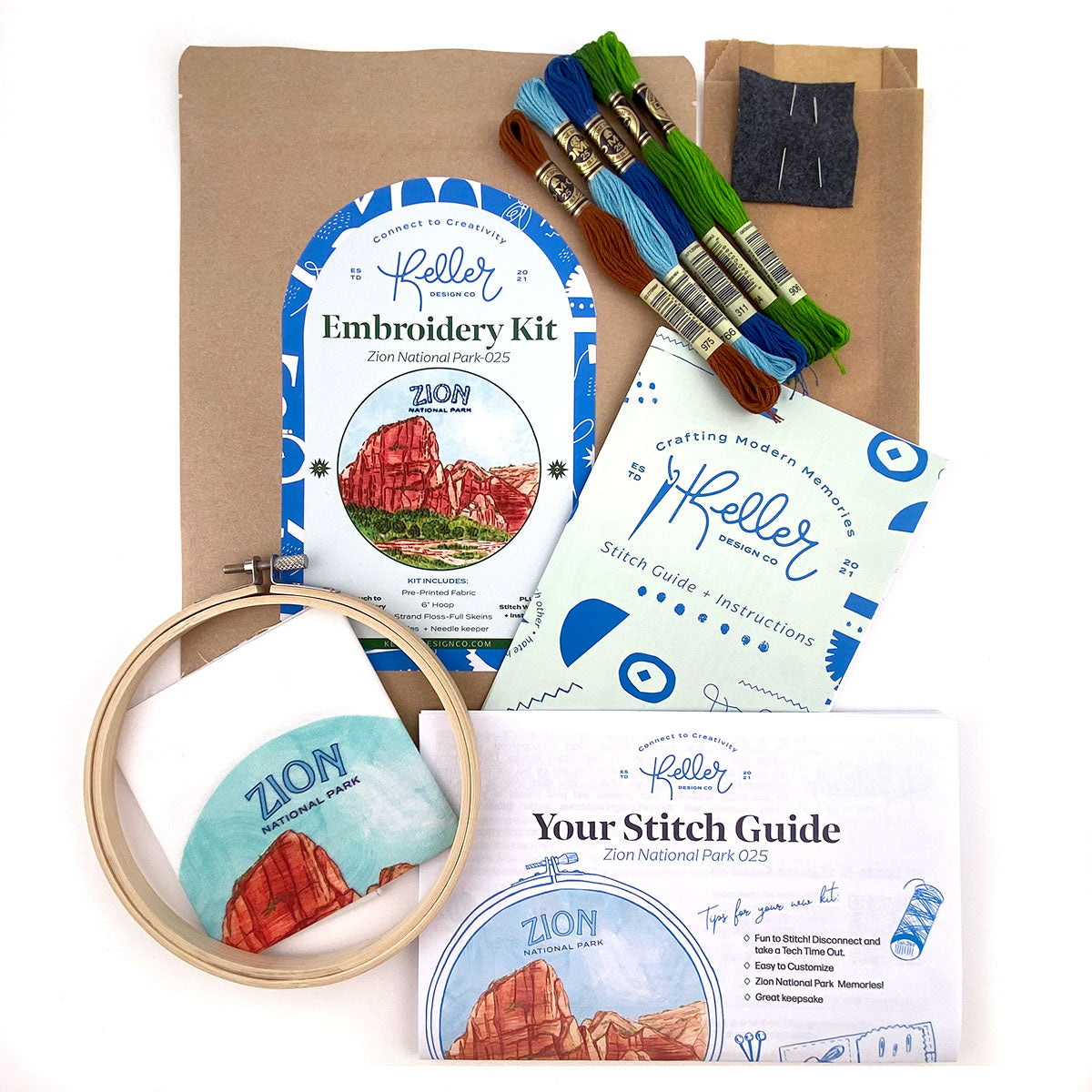 Zion National Park Embroidery Kit in a hoop sitting on top of an illustration of Zion Angels Rest