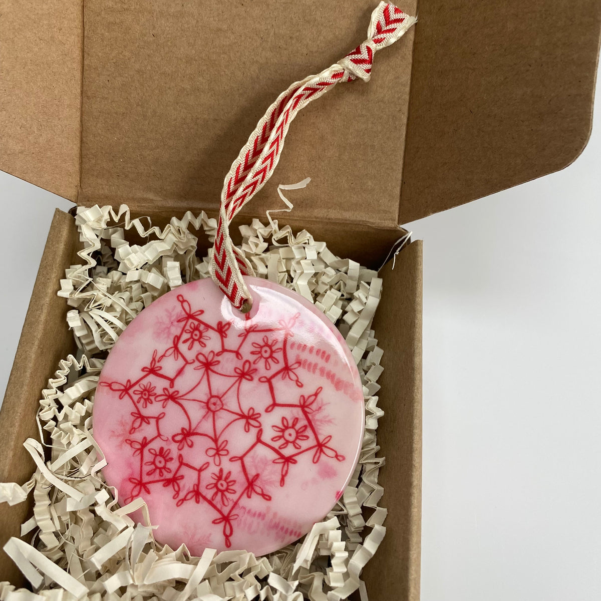 KRAFT BOX-Ceramic Ornament with Red Let it Snow Print