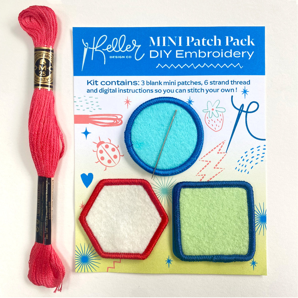 Embroidery kit with pink thread and packaging on a white background
