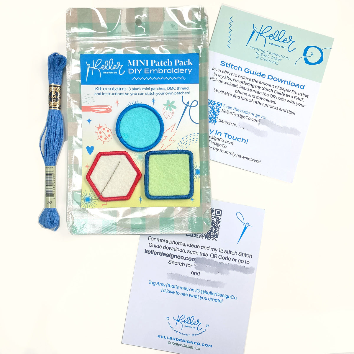 Embroidery kit with thread, patches, and instructions on a white background