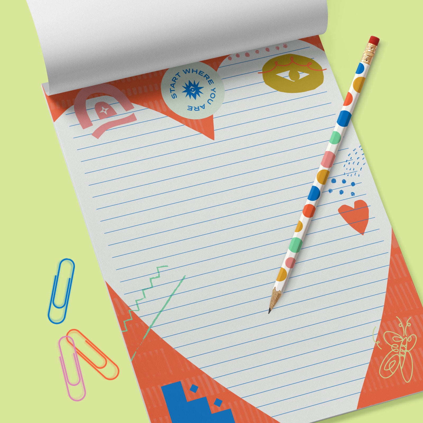 Red and white colorful notepad with the saying Start Where You Are at the top. On a lime green background. 