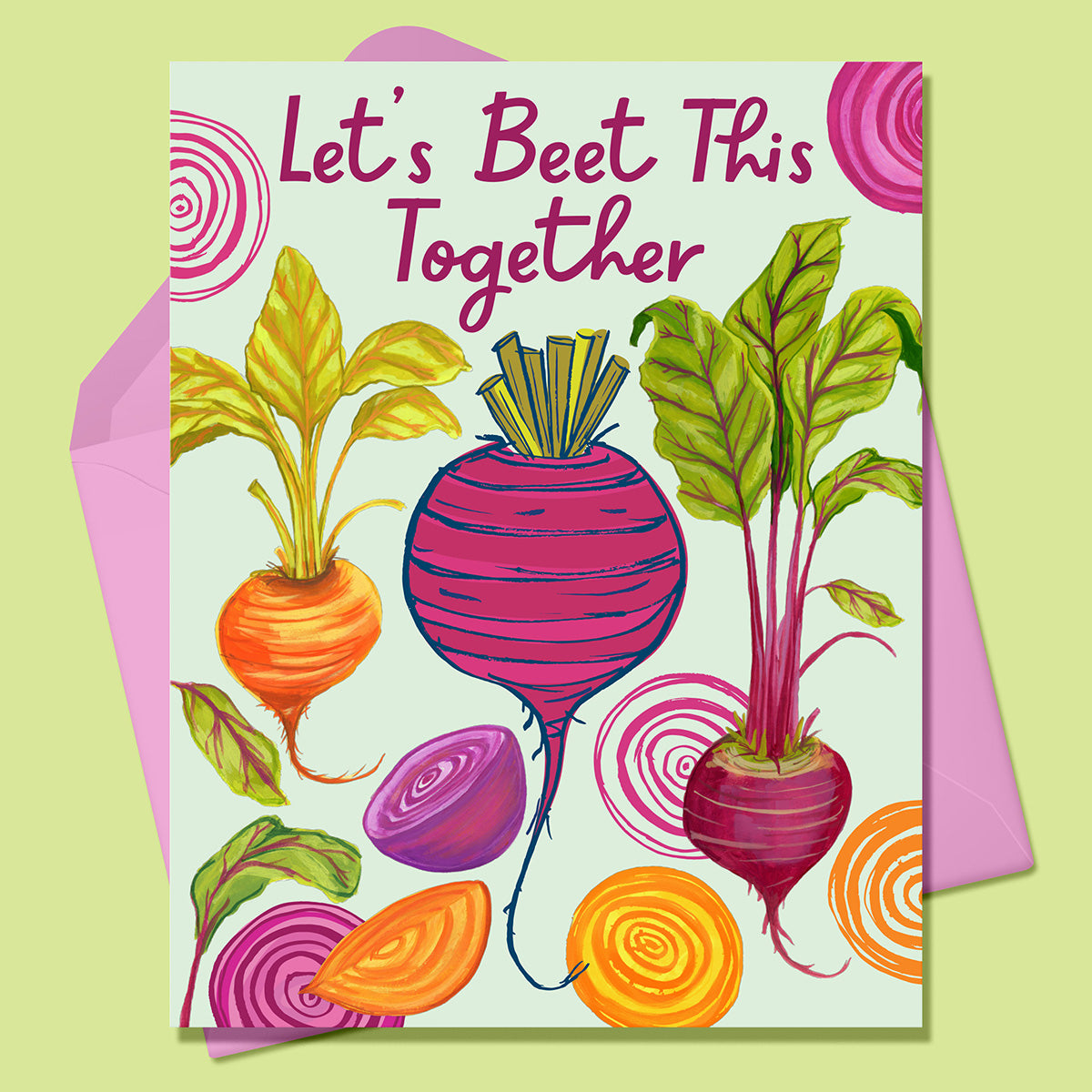 Paper Greeting card with the image of brightly colored beets in orange, pink, purple, on a mint background. Text says Let&#39;s Beet This Together. With a pink envelope. On a lime green background.