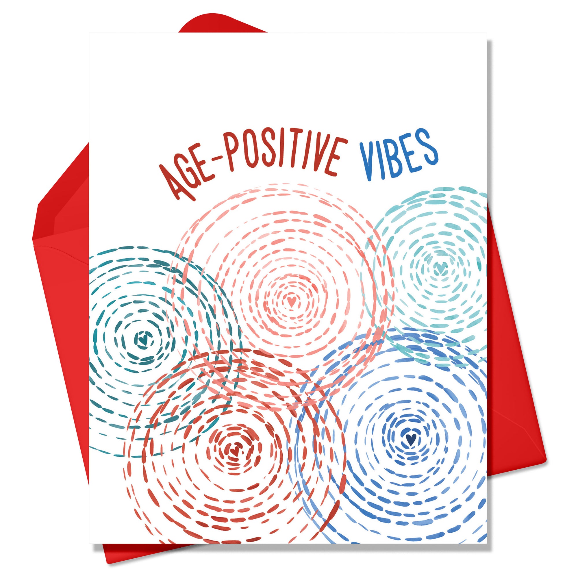 Age Positive Vibes Greeting cards. Intersecting , radiating hand painted circles overlapping. . There is a red envelope and it sits on a white background. 